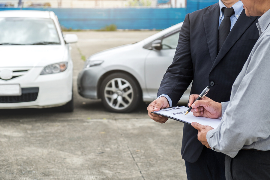 going through car accident coverage with insurance agent