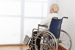 elderly person in a wheelchair at a nursing home