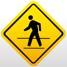 yellow crosswalk sign