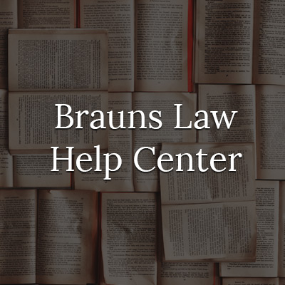 books with text overlay "Brauns Law Help Center"