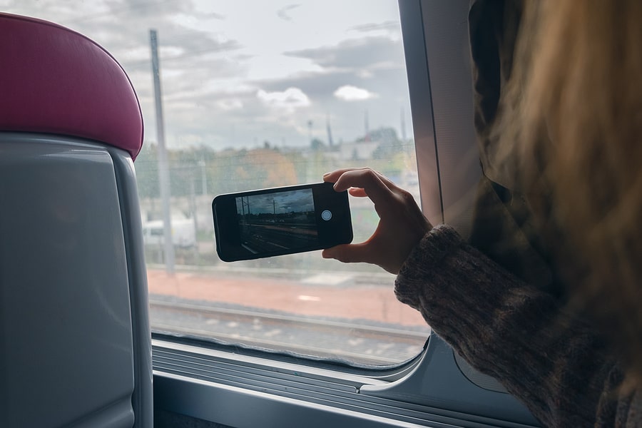taking a photo from a train