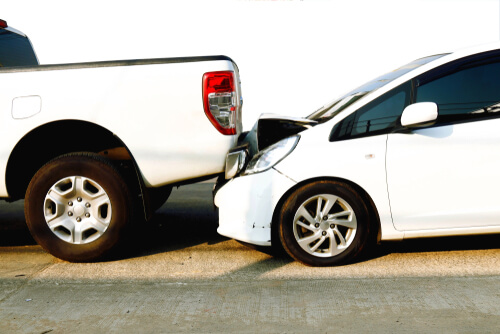 white car rear ends truck in Atlanta