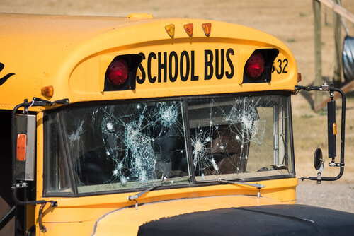Duluth school bus with front windshield damage