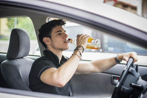 young man drinking and driving in Gwinnett County