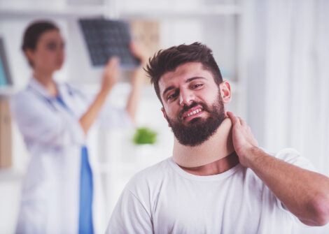 injured man with doctor