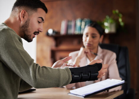 injured man with woman lawyer