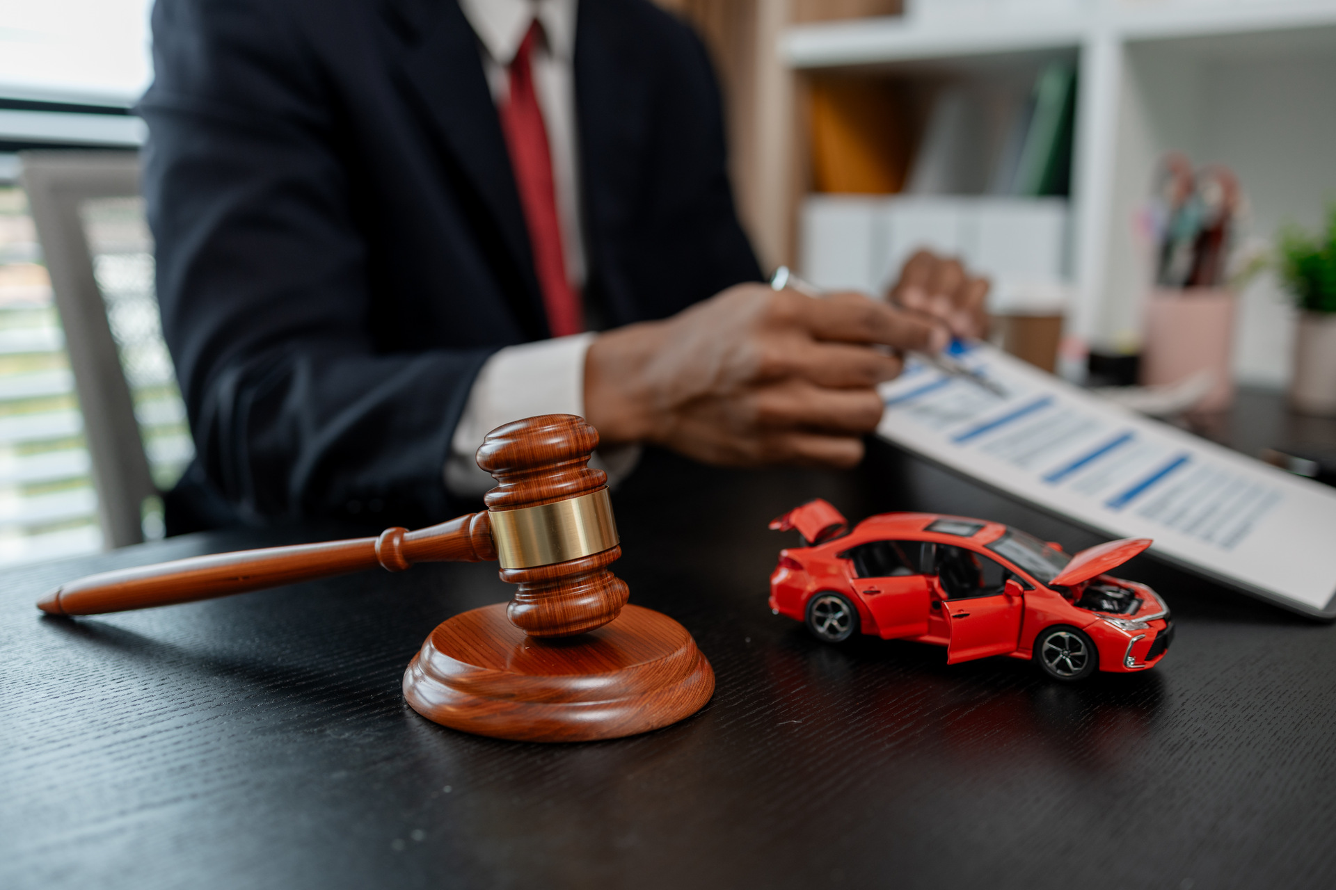 Lawyer reviewing car accident case