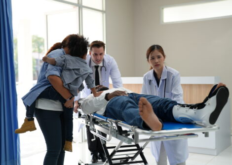 Healthcare and Medicine! The hospital pre op room, nurses station and patient prep areas. Nurses hurry about, getting the patients ready for surgical procedures, to keep the doctors on their surgery schedule. A family member checks on the status of her relative.